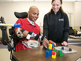 Therapist conducting occupational therapy session with a patient