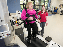 Woman on body weight supported treadmill