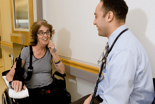 brain injury patient talking to her therapist