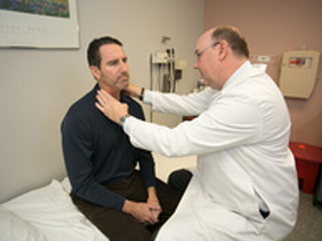 cancer patient working with physical therapist