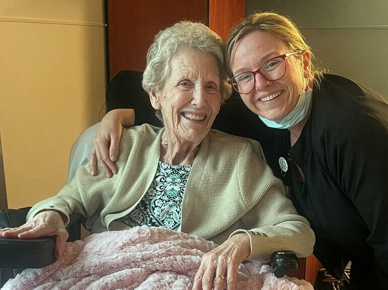 Photo of Shirley Shand with her therapist at Kessler Institute for Rehabilitation.