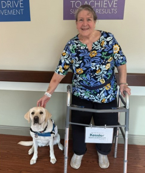Photo of Renate Murray and Facility Dog Crowley at Kessler Institute for Rehabilitation - Marlton.