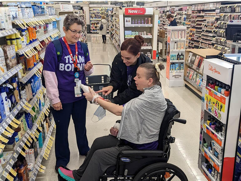 Photo of Bonnie Weil with therapists on a therapeutic outing.. 