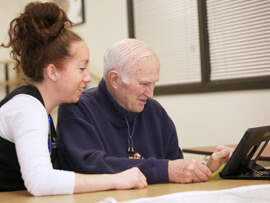 elderly patient working with therapist